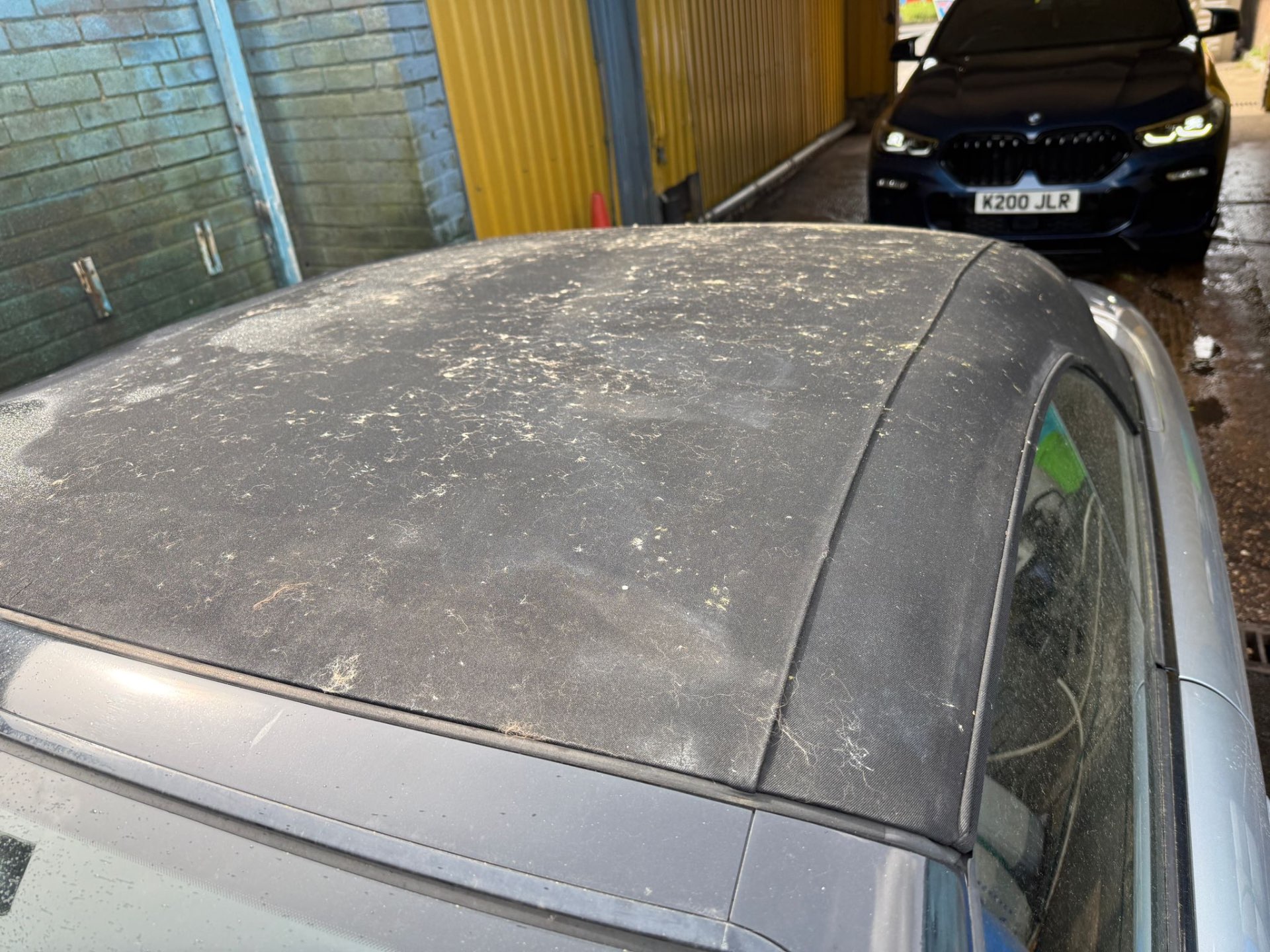 Before — Convertible soft top — pollen & dirt removed
